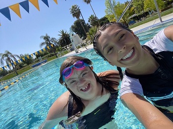 Sophie and Ariana swimming